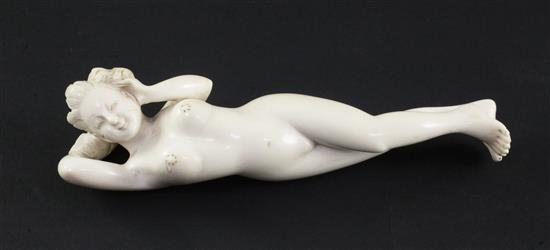 A Chinese ivory doctors figure of a reclining nude woman, late 19th/early 20th century, 15.5cm